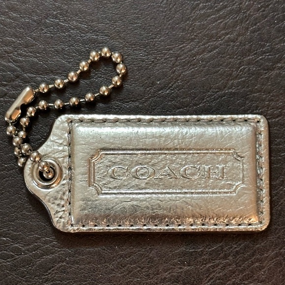 Coach Metallic Silver Leather Replacement Hangtag 2.5 inches Long - Picture 1 of 7